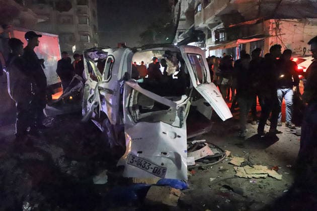 Destroyed Car Al-Nasr Street Gaza City People gather around the wreckage of a vehicle, targeted on Al-Nasr Street in Gaza City, Gaza Strip, on May 16, 2026. Gaza Gaza Strip Palestinian Territories Copyright: xAhmedxAlxArinix