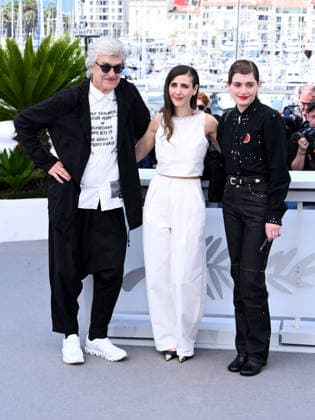 IPA84782031 - Cannes, 79th Cannes Film Festival 2026, Day 6. Photocall of the film I ll Be Gone In June. Pictured are Wim Wenders, Katharina Rivilis, Naomi Cosma  Copyright: xAlbertoxTerenghix xPoolxPhotoxEventsx07x 84782031