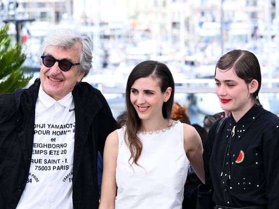 IPA84782034 - Cannes, 79th Cannes Film Festival 2026, Day 6. Photocall of the film I ll Be Gone In June. Pictured are Wim Wenders, Katharina Rivilis, Naomi Cosma  Copyright: xAlbertoxTerenghix xPoolxPhotoxEventsx07x 84782034