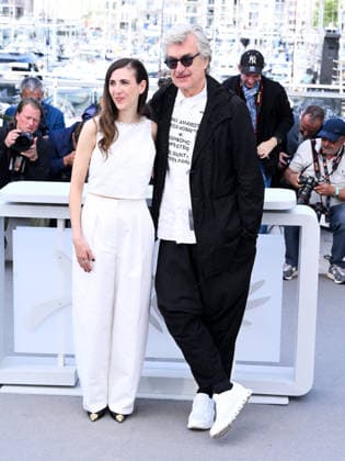 IPA84782046 - Cannes, 79th Cannes Film Festival 2026, Day 6. Photocall of the film I ll Be Gone In June. Pictured are Wim Wenders, Katharina Rivilis  Copyright: xAlbertoxTerenghix xPoolxPhotoxEventsx07x 84782046