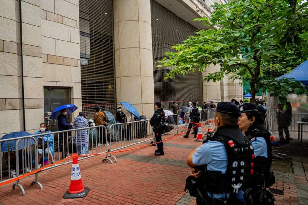 Closing arguments of Tiananmen Square activists trial starts HONG KONG, CHINA - MAY 18: Police officers stand guard outside the West Kowloon Magistrates Court in Hong Kong, China, on May 18, 2026. Closing arguments in the national security case involving the Hong Kong Alliance in Support of Patriotic Democratic Movements of China are scheduled to last three days. Lee Cheuk-yan, 69, and Chow Hang-tung, 41, who organised candlelight vigils to mark Beijing s deadly crackdown on demonstrators in Tiananmen Square in 1989, are standing trial for incitement to subversion , which carries a maximum penalty of 10 years in jail. Harry Leung Anadolu Hong Kong China. Editorial use only. Please get in touch for any other usage.  Copyright: x2026xAnadoluxHarryxLeungx