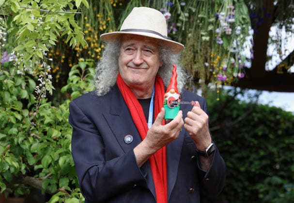 May 18, 2026, London, London, UK: London, UK. Musician Sir Brian May, with his gnome in The KingÃ¢â‚¬â ¢s Foundation Curious Garden at The RHS Chelsea Flower Show has been held at the Royal Hospital Chelsea in London since 1913 London UK  - ZUMAl94_ 20260518_zaf_l94_022 Copyright: xJacquelinexLawriex