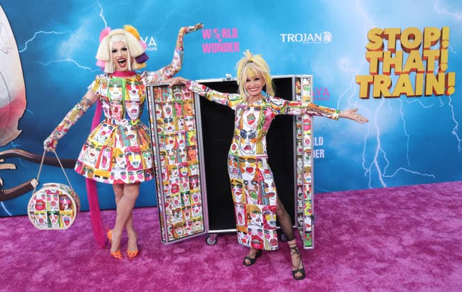 Katy Bahm and Betsey Johnson attend the Los Angeles premiere of Stop! That Train! at Harmony Gold on Monday, May 18, 2026. Storyline: Two train stewardess BFFs switch from a dull railway to the luxurious Glamazonian Express. During a massive storm, they must work with snooty first-class crew and President Gagwell to prevent disaster in LA.  LAP20260518668 GREGxGRUDT