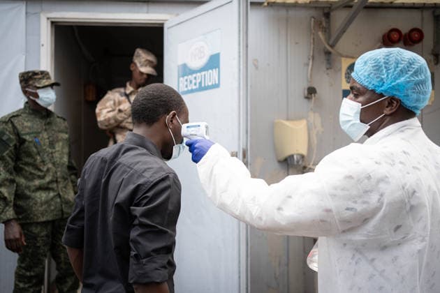 (260519) -- GOMA, May 19, 2026 -- A medical worker checks the temperature of a local resident as part of Ebola screening in Goma, the Democratic Republic of the Congo (DRC), on May 19, 2026. Around 131 suspected deaths and 513 suspected cases have been reported in the latest Ebola outbreak in the Democratic Republic of the Congo, DRC Health Minister Roger Kamba said Tuesday. ( Xinhua) DR CONGO-GOMA-EBOLA OUTBREAK Str 