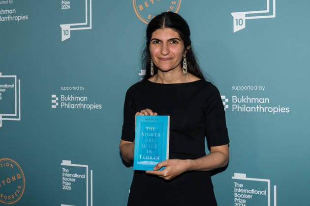 International Booker Prize 2026 Award Ceremony in London LONDON, UNITED KINGDOM - MAY 19: Author Shida Bazyar poses with the book titled ‘The Nights Are Quiet in Tehran’ during the official winners’ ceremony of the International Booker Prize 2026 at Tate Modern in London, United Kingdom on May 19, 2026. The International Booker Prize is awarded annually for the finest single work of fiction from around the world which has been translated into English and published in the UK and Ireland. Wiktor Szymanowicz Anadolu London United Kingdom. Editorial use only. Please get in touch for any other usage.  Copyright: x2026xAnadoluxWiktorxSzymanowiczx