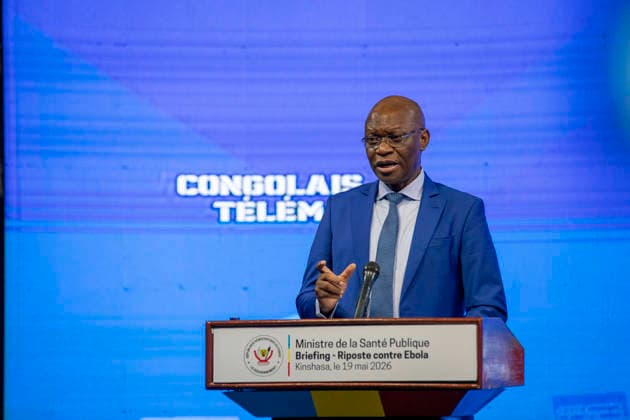 (260519) -- KINSHASA, May 19, 2026 -- Roger Kamba, Health Minister of the Democratic Republic of the Congo (DRC), speaks at a press briefing on the Ebola outbreak in Kinshasa, DRC capital, on May 19, 2026. During a media briefing on Tuesday, DRC Health Minister Roger Kamba said that 543 suspected cases were recorded, including 32 laboratory-confirmed cases, while the death toll reached 136. (Str Xinhua) DR CONGO-KINSHASA-EBOLA OUTBREAK-PRESS BRIEFING XinxHuashefa 