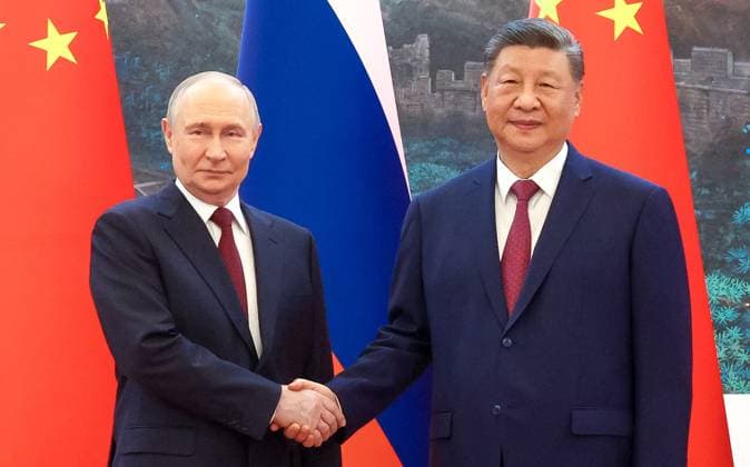 China Russia 9169371 20.05.2026 Russian President Vladimir Putin and Chinese President Xi Jinping shake hands as they pose for photos before a meeting at the Great Hall of the People in Beijing, China. Maxim Stulov Sputnik Beijing China  Copyright: xMaximxStulovx