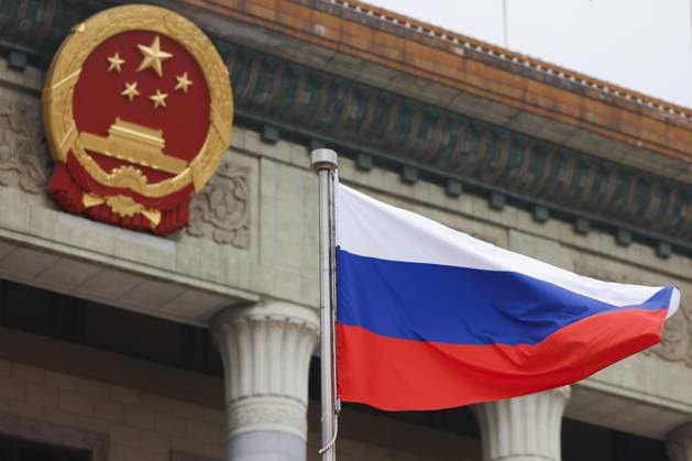 China-Russia summit A Russian flag is hoisted at the Great Hall of the People in Beijing on May 20, 2026, ahead of a summit between Chinese President Xi Jinping and Russian President Vladimir Putin. (Pool photo)  A14AA0005587097P