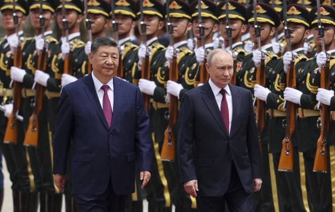 China-Russia summit Russian President Vladimir Putin (R) attends a welcoming ceremony with Chinese President Xi Jinping at the Great Hall of the People in Beijing ahead of their summit meeting on May 20, 2026. (Pool photo)  A14AA0005587100P