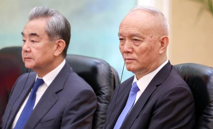 China Russia 9169416 20.05.2026 Director of the Chinese Communist Party General Office Cai Qi and Chinese Foreign Minister Wang Yi attends a narrow format meeting between Russian President Vladimir Putin and Chinese President Xi Jinping at the Great Hall of the People in Beijing, China. Alexander Kazakov Sputnik Beijing China  Copyright: xAlexanderxKazakovx