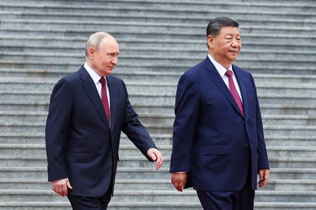 CHINA, BEIJING - MAY 20, 2026: Vladimir Putin (L), President of Russia, and his counterpart Xi Jinping of China emerge during a welcoming ceremony in Tiananmen Square. Putin s official visit marks 25 years since the 2001 Treaty of Good Neighbourliness and Friendly Cooperation between Russia and China. Alexander Kazakov Russian Presidential Press and Information Office TASS  92771015