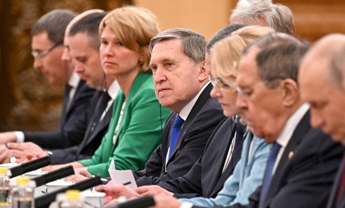 China Russia 9169427 20.05.2026 Russian Presidential Aide Yury Ushakov, centre, attends an expanded format meeting between Russian President Vladimir Putin and Chinese President Xi Jinping at the Great Hall of the People in Beijing, China. Kristina Solovyova Sputnik Beijing China  Copyright: xKristinaxSolovyovax