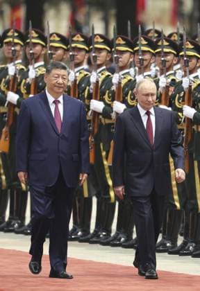 China-Russia summit Russian President Vladimir Putin (R) attends a welcoming ceremony with Chinese President Xi Jinping at the Great Hall of the People in Beijing ahead of their summit meeting on May 20, 2026. (Pool photo)  A14AA0005587376P