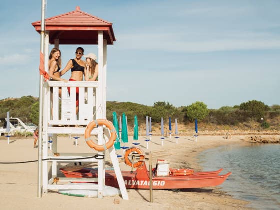 Rescue Boat and Lifeguard Tower with Three Women at Beach Porto San Paolo, Sardegna, Italy CR_MORW2605135D-2024260-01 ,model released, Symbolfoto