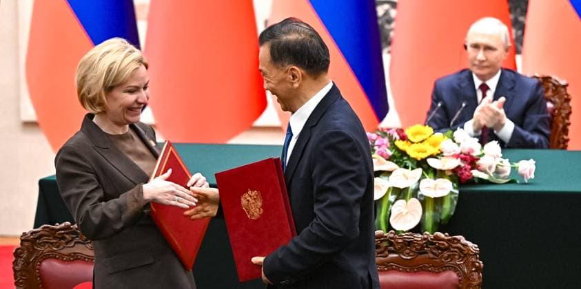 China Russia 9169455 20.05.2026 Russian Culture Minister Olga Lyubimova and head of the China Media Group Shen Haixiong attend a signing ceremony following a meeting of Russian President Vladimir Putin with Chinese President Xi Jinping in expanded format at the Great Hall of the People in Beijing, China. Kristina Solovyova Sputnik Beijing China  Copyright: xKristinaxSolovyovax