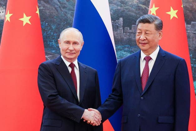 CHINA, BEIJING - MAY 20, 2026: Vladimir Putin (L), President of Russia, and his counterpart Xi Jinping of China pose shaking hands at the Great Hall of the People. Putin s official visit marks 25 years since the 2001 Treaty of Good Neighbourliness and Friendly Cooperation between Russia and China. Maxim Stulov POOL TASS  92768945