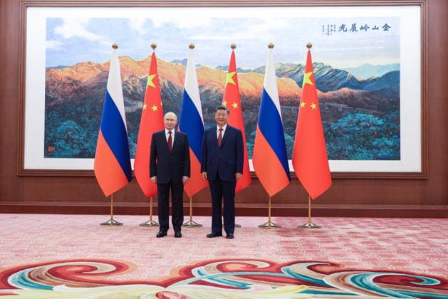 CHINA, BEIJING - MAY 20, 2026: Vladimir Putin (L), President of Russia, and his counterpart Xi Jinping of China pose together at the Great Hall of the People. Putin s official visit marks 25 years since the 2001 Treaty of Good Neighbourliness and Friendly Cooperation between Russia and China. Maxim Stulov POOL TASS  92769053
