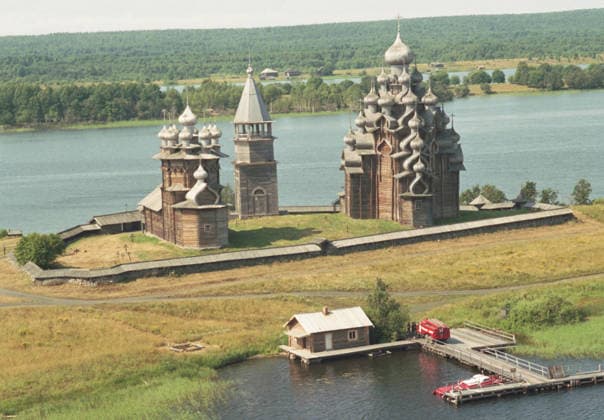 Republic Of Karelia, Russia. The view from helicopter shows the Church of the Intercession of the Virgin, the belfry and the Church of the Transfiguration (L-R) of the Kizhi Pogost at the Kizhi State Historical, Architectural and Ethnographic Museum-Reserve on Kizhi Island located on Lake Onega. Semyon Maisterman TASS  32398497