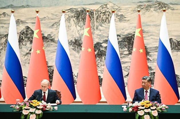 CHINA, BEIJING - MAY 20, 2026: Vladimir Putin (L), President of Russia, and his counterpart Xi Jinping of China sign joint documents following bilateral talks at the Great Hall of the People. Putin s official visit marks 25 years since the 2001 Treaty of Good Neighbourliness and Friendly Cooperation between Russia and China. Kristina Solovyova POOL TASS  92773579