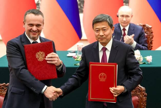 China Russia 9169541 20.05.2026 Russian Transport Minister Andrey Nikitin and head of Chinese National Railway Administration Song Xiude attend a signing ceremony following a meeting of Russian President Vladimir Putin with Chinese President Xi Jinping in expanded format at the Great Hall of the People in Beijing, China. Alexander Kazakov Sputnik Beijing China  Copyright: xAlexanderxKazakovx