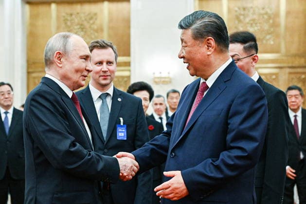 CHINA, BEIJING - MAY 20, 2026: Vladimir Putin, President of Russia, and his counterpart Xi Jinping (L-R front) of China emerge after a ceremony to sign joint documents from bilateral talks at the Great Hall of the People. Putin s official visit marks 25 years since the 2001 Treaty of Good Neighbourliness and Friendly Cooperation between Russia and China. Kristina Solovyova POOL TASS  92772871