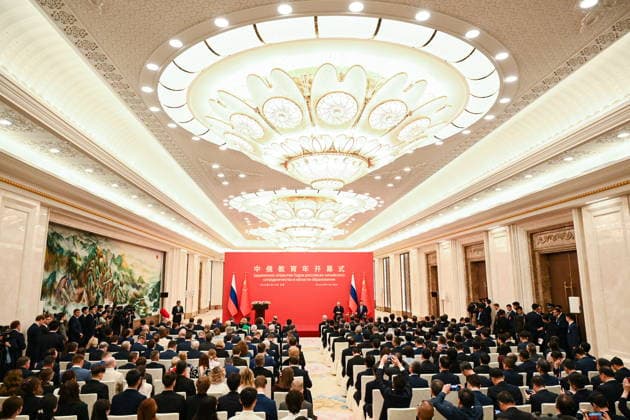 CHINA, BEIJING - MAY 20, 2026: Vladimir Putin, President of Russia, and his counterpart Xi Jinping (L-R back) of China attend a ceremony to declare 2026 and 2026 the Cross Years of Russian-Chinese Cooperation in Education at the Great Hall of the People. Putin s official visit marks 25 years since the 2001 Treaty of Good Neighbourliness and Friendly Cooperation between Russia and China. Kristina Solovyova POOL TASS  92774217