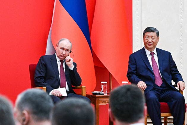 CHINA, BEIJING - MAY 20, 2026: Vladimir Putin (L), President of Russia, and his counterpart Xi Jinping of China attend a ceremony to declare 2026 and 2026 the Cross Years of Russian-Chinese Cooperation in Education at the Great Hall of the People. Putin s official visit marks 25 years since the 2001 Treaty of Good Neighbourliness and Friendly Cooperation between Russia and China. Kristina Solovyova POOL TASS  92774251