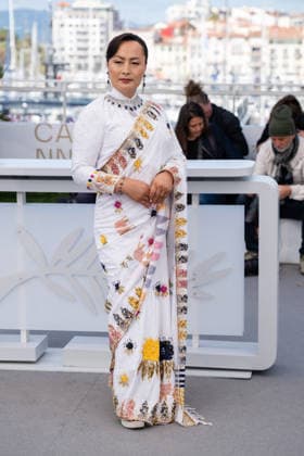 Cannes Elephants In The Fog Photocall LZ Pushpa Thing Lama attending the photocall of Elephants In The Fog during the 79th Cannes International Film Festival in Cannes, France on May 20, 2026, the film selected in the Official Competition. Photo by Laurent Zabulon ABACAPRESS.COM  Copyright: xZabulonxLaurentx
