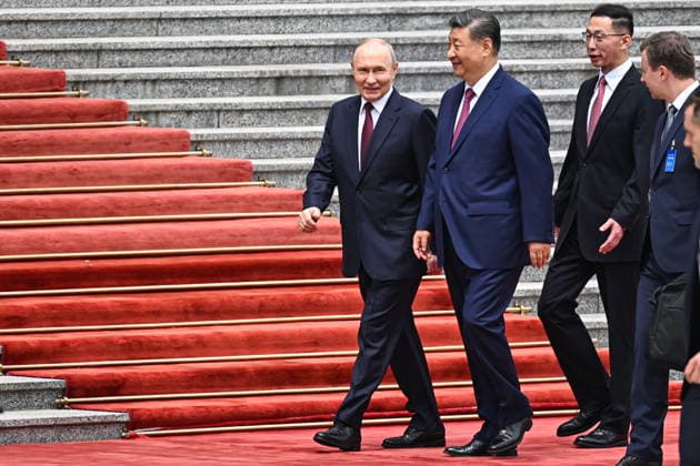 CHINA, BEIJING - MAY 20, 2026: Vladimir Putin, President of Russia, and his counterpart Xi Jinping (L-R) of China attend a welcoming ceremony in Tiananmen Square. Putin s official visit marks 25 years since the 2001 Treaty of Good Neighbourliness and Friendly Cooperation between Russia and China. Kristina Solovyova POOL TASS  92768540