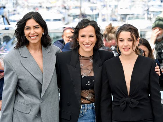 IPA84892455 - Cannes, 79th Cannes Film Festival 2025 - day 9. photocall of Le Triangle D Or Pictured: Soundos Mosbah, HÃ lene Rosselet-Ruiz and Malou Khebizi  Copyright: xAlbertoxTerenghix xPoolxPhotoxEventsx07x 84892455