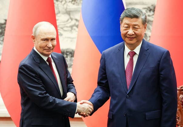 CHINA, BEIJING - MAY 20, 2026: Vladimir Putin (L), President of Russia, and his counterpart Xi Jinping of China shake hands during a ceremony to sign joint documents from bilateral talks at the Great Hall of the People. Putin s official visit marks 25 years since the 2001 Treaty of Good Neighbourliness and Friendly Cooperation between Russia and China. Alexander Kazakov Russian Presidential Press and Information Office TASS  92775734