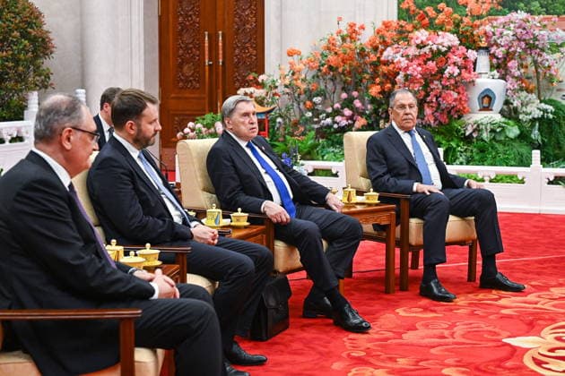 CHINA, BEIJING - MAY 20, 2026: Sergei Lavrov, Foreign Minister of Russia, Presidential Aide Yuri Ushakov, Maxim Oreshkin, Deputy Chief of Staff, Presidential Executive eOffice, and Ambassador Igor Morgulov (R-L) attend informal tea meeting at the Great Hall of the People. Vladimir Putin, President of Russia, makes an official visit to mark 25 years since the 2001 Treaty of Good Neighbourliness and Friendly Cooperation between Russia and China Beijing China  - ZUMAt113 20260520_zaa_t113_490 Copyright: xKristinaxSolovyovax