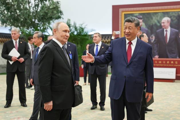 CHINA, BEIJING - MAY 20, 2026: Vladimir Putin, President of Russia, and his counterpart Xi Jinping (L-R front) of China view a photography exhibition titled Unwavering Friendship of the Great Nations, Strategic Partnership of the Great Powers and held jointly by TASS and Xinhua to mark 25 years since the 2001 Treaty of Good Neighbourliness and Friendly Cooperation between Russia and China. Alexander Kazakov Russian Presidential Press and Information Office TASS  92783783