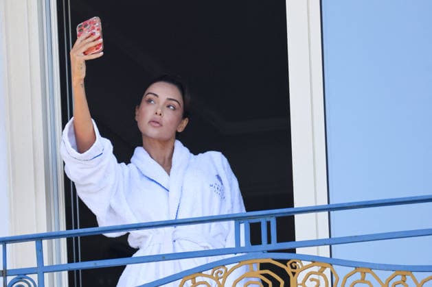 Cannes - Nabilla Is Taking Selfies on The Martinez Balcony Nabilla Benattia is seen at the Hotel Martinez during the 79th annual Cannes Film Festival on May 20, 2026 in Cannes, France. Photo by Shootpix ABACAPRESS.COM Cannes France  Copyright: xShootPix ABACAx