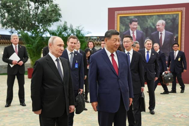 CHINA, BEIJING - MAY 20, 2026: Vladimir Putin, President of Russia, and his counterpart Xi Jinping (L-R front) of China view a photography exhibition titled Unwavering Friendship of the Great Nations, Strategic Partnership of the Great Powers and held jointly by TASS and Xinhua to mark 25 years since the 2001 Treaty of Good Neighbourliness and Friendly Cooperation between Russia and China. Alexander Kazakov Russian Presidential Press and Information Office TASS  92783812