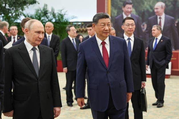 CHINA, BEIJING - MAY 20, 2026: Vladimir Putin, President of Russia, and his counterpart Xi Jinping (L-R front) of China view a photography exhibition titled Unwavering Friendship of the Great Nations, Strategic Partnership of the Great Powers and held jointly by TASS and Xinhua to mark 25 years since the 2001 Treaty of Good Neighbourliness and Friendly Cooperation between Russia and China. Alexander Kazakov Russian Presidential Press and Information Office TASS  92783815