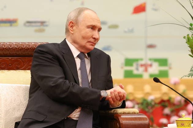 CHINA, BEIJING - MAY 20, 2026: Vladimir Putin, President of Russia, attends an informal tea meeting with his counterpart Xi Jinping of China at the Great Hall of the People. Putin s official visit marks 25 years since the 2001 Treaty of Good Neighbourliness and Friendly Cooperation between Russia and China. Alexander Kazakov Russian Presidential Press and Information Office TASS  92784656