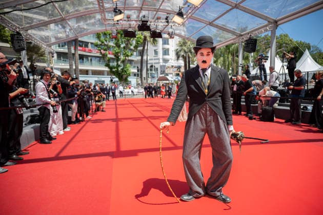 Cannes Notre Salut Red Carpert EB Charlie Chaplin lookalike Anthony Charlot Champeil on the red carpet before the Notre Salut screening during the 79th annual Cannes Film Festival at Palais des Festivals on May 20, 2026 in Cannes, France. Photo by Eliot Blondet ABACAPRESS.COM Cannes France France  Copyright: xBlondetxEliot ABACAx