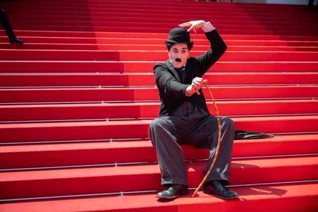 Cannes Notre Salut Red Carpert EB Charlie Chaplin lookalike Anthony Charlot Champeil on the red carpet before the Notre Salut screening during the 79th annual Cannes Film Festival at Palais des Festivals on May 20, 2026 in Cannes, France. Photo by Eliot Blondet ABACAPRESS.COM Cannes France France  Copyright: xBlondetxEliot ABACAx
