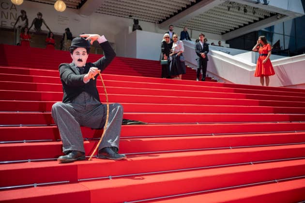 Cannes Notre Salut Red Carpert EB Charlie Chaplin lookalike Anthony Charlot Champeil on the red carpet before the Notre Salut screening during the 79th annual Cannes Film Festival at Palais des Festivals on May 20, 2026 in Cannes, France. Photo by Eliot Blondet ABACAPRESS.COM Cannes France France  Copyright: xBlondetxEliot ABACAx