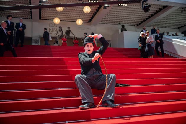 Cannes Notre Salut Red Carpert EB Charlie Chaplin lookalike Anthony Charlot Champeil on the red carpet before the Notre Salut screening during the 79th annual Cannes Film Festival at Palais des Festivals on May 20, 2026 in Cannes, France. Photo by Eliot Blondet ABACAPRESS.COM Cannes France France  Copyright: xBlondetxEliot ABACAx