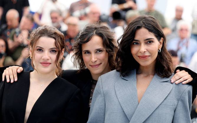 Malou Khebizi, Hélène Rosselet Ruiz and Soundos Mosbah at the photocall of the film Le Triangle D Or at the 79th International Film Festival in Cannes, France on May 20, 2026 Jacovides Moreau Bestimage Le Triangle D Or photocall at the 79th annual Cannes Film Festival at Palais des Festivals on May 20, 2026 in Cannes, France Cannes France  Copyright: xJACOVIDES-MOREAUx xBESTIMAGExJACOVIDES-MOREAUx xBESTIMAGEx