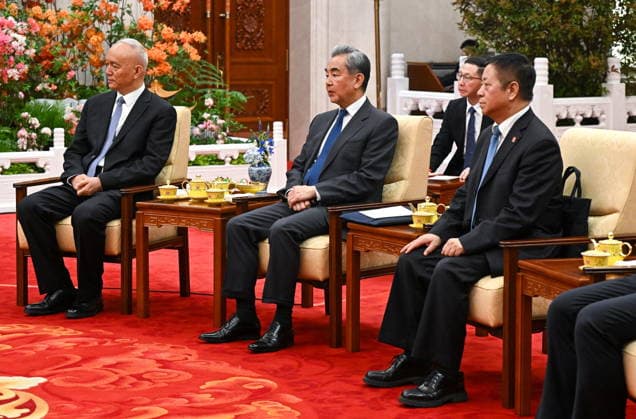 CHINA, BEIJING - MAY 20, 2026: Cai Qi, Secretary of the Secretariat of the Chinese Communist Party, and Foreign Minister Wang Yi and China s Ambassador to Russia Zhang Hanhui (L-R front) attend an informal tea meeting at the Great Hall of the People. Vladimir Putin, President of Russia, makes an official visit to mark 25 years since the 2001 Treaty of Good Neighbourliness and Friendly Cooperation between Russia and China. Kristina Solovyova POOL TASS  92786919
