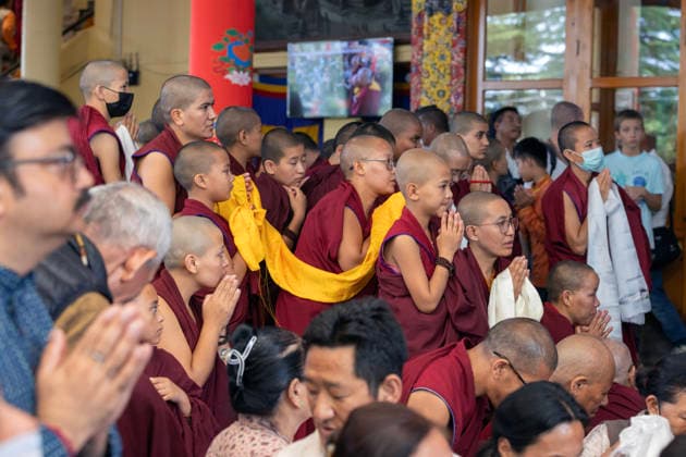 May 20, 2026, Palampur, Dharamshala, India: Novices monks and young budhist nuns watching Tibetan spiritual Leader the Dalai Lama (not in picture) leaving the temple after end of a long life prayer offered to him by Central Dokham Chushi Gangdrug and Himalayan Buddhist Cultural Association at the Main Tibetan Temple in Mcleodganj, Dharamshala ..NOTE: EDITORIAL USE ONLY. Palampur India  - ZUMAb235 20260520_zip_b235_005 Copyright: xShaileshxBhatnagarx