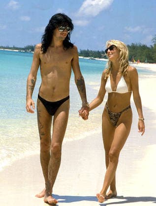 Heather Locklear and Tommy Lee on their Honeymoon Feb 03, 2006; Grand Cayman, CAYMAN ISLANDS; File photo, 1986: HEATHER LOCKLEAR and ex-husband TOMMY LEE on thier honeymoon in the Caribbean. Mandatory Credit: Photo by Ray Fairall ZUMA Press. ( ) Copyright 2006 by Ray Fairall Grand Cayman CAYMAN ISLANDS Copyright: xRayxFairallx