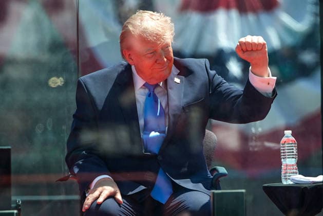 President Donald Trump attends the United States Coast Guard Academy s graduation ceremony in New London, Connecticut on Wednesday, May 20, 2026. President Trump will deliver the commencement address.  CONN20260520447 ANGELINAxKATSANIS