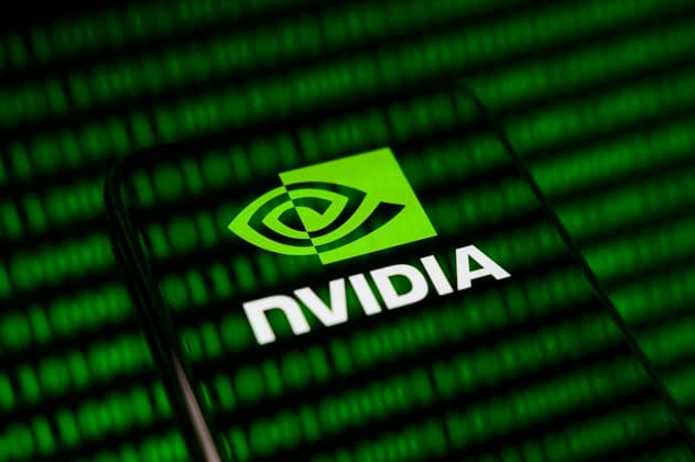 Photo Illustration - Nvidia Earnings The Nvidia logo is displayed on a smartphone screen placed on a reflective surface onto which a green binary code illustration is projected, in Creteil, France, on May 20, 2026. The global technology leader is scheduled to release its financial results for the first quarter of fiscal year 2027. CrÃ teil France  Copyright: xSamuelxBoivinx originalFilename: boivin-notitle260520_npxEY.jpg