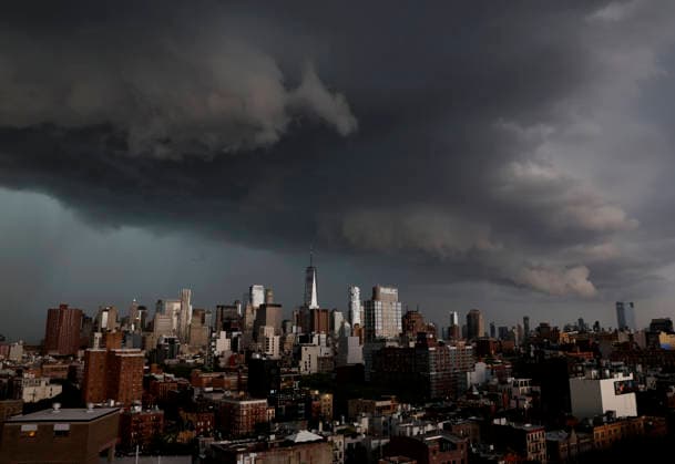 Storm clouds and dark skies move in behind One World Trade Center and Manhattan Skyline bringing thunderstorms in the early evening on Wednesday, May 20, 2026 in New York City.  NYP20260520133 JOHNxANGELILLO