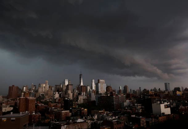 Storm clouds and dark skies move in behind One World Trade Center and Manhattan Skyline bringing thunderstorms in the early evening on Wednesday, May 20, 2026 in New York City.  NYP20260520134 JOHNxANGELILLO