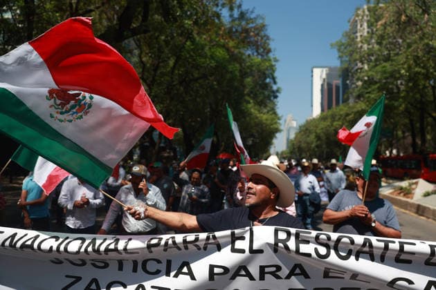 Transport workers and farmers lead rally in Mexico City MEXICO CITY, MEXICO - MAY 20: Transport workers and farmers hold Mexican flags as they take part in a rally to demand more security on highways, in Mexico City, Mexico on May 20, 2026. Under the slogan Without support for farmers, there will be no World Cup, hundreds of transport workers and farmers from several states across Mexico gathered to demand greater security nationwide, particularly on highways where criminal activity has increased, as well as more government support for the agricultural sector. Daniel Cardenas Anadolu Mexico City Mexico. Editorial use only. Please get in touch for any other usage.  Copyright: x2026xAnadoluxDanielxCardenasx
